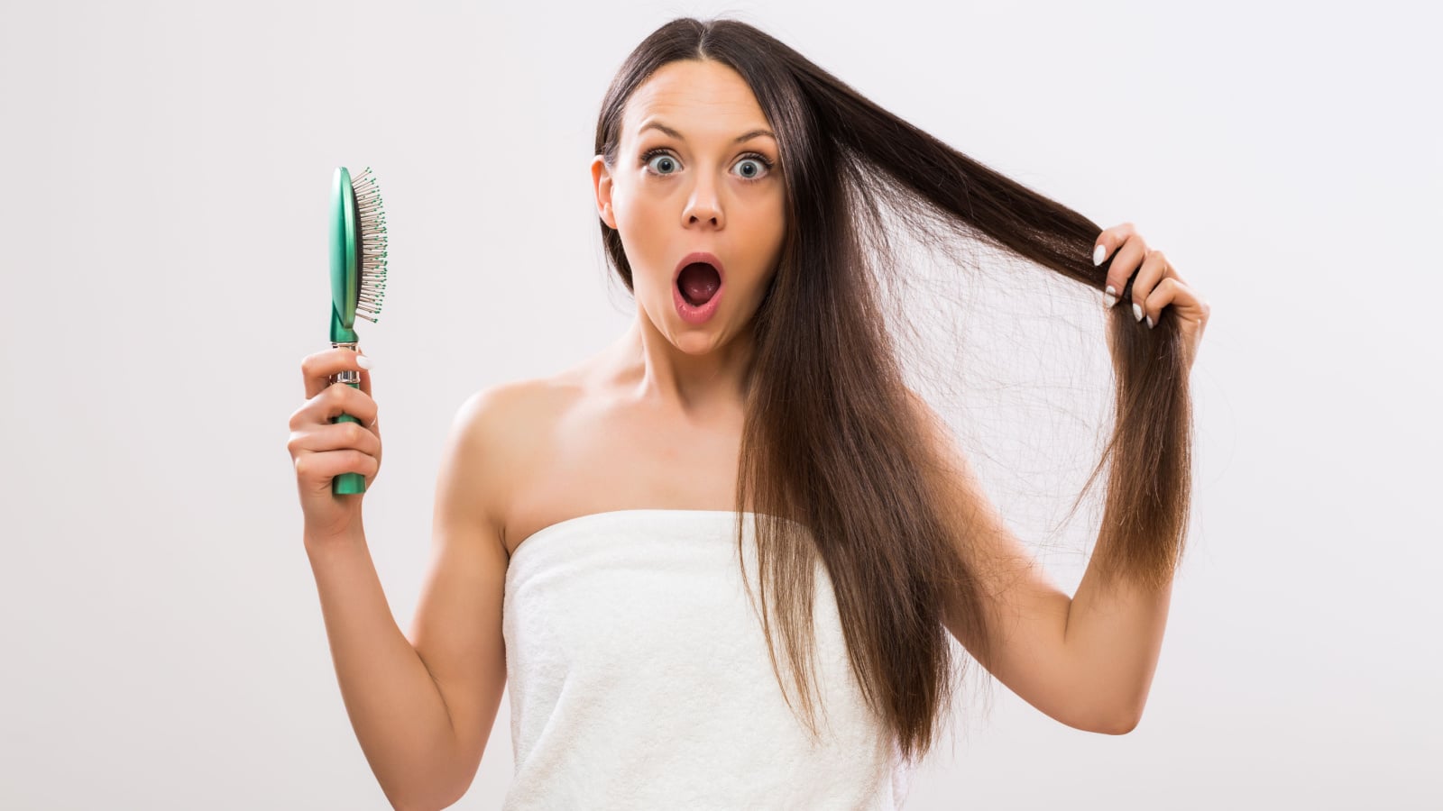 woman brushing hair wow