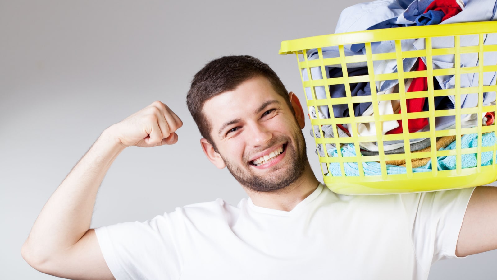 man doing laundry chores