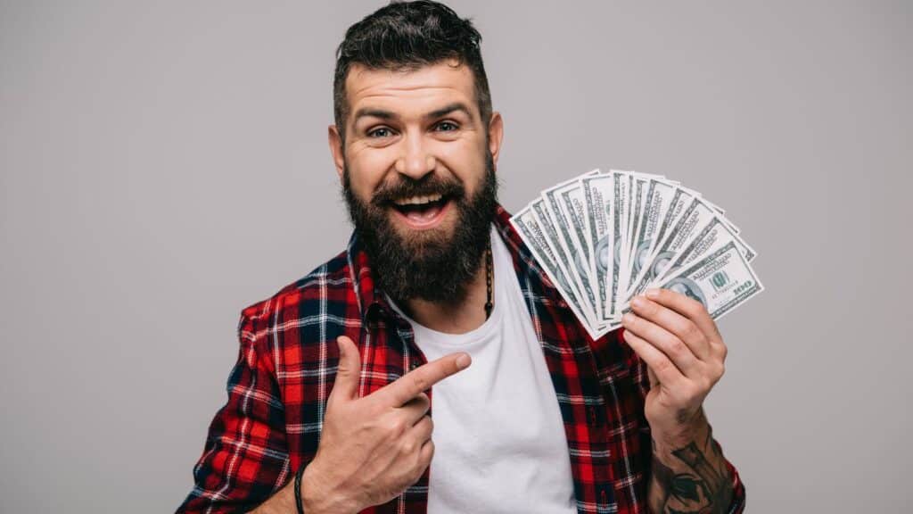 man excited money