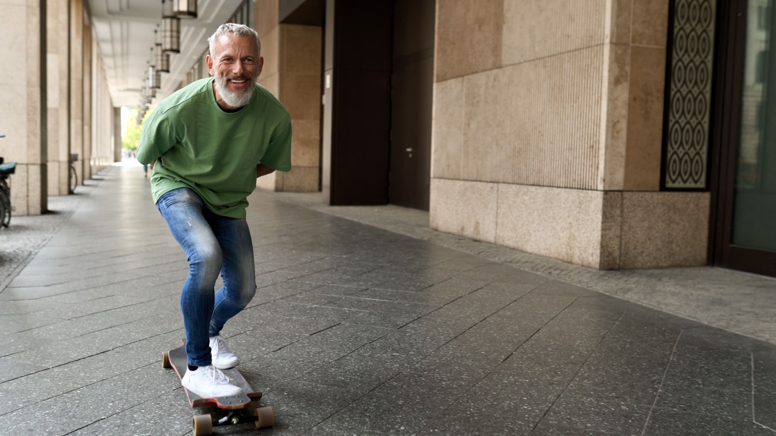 middle age older man on skateboard