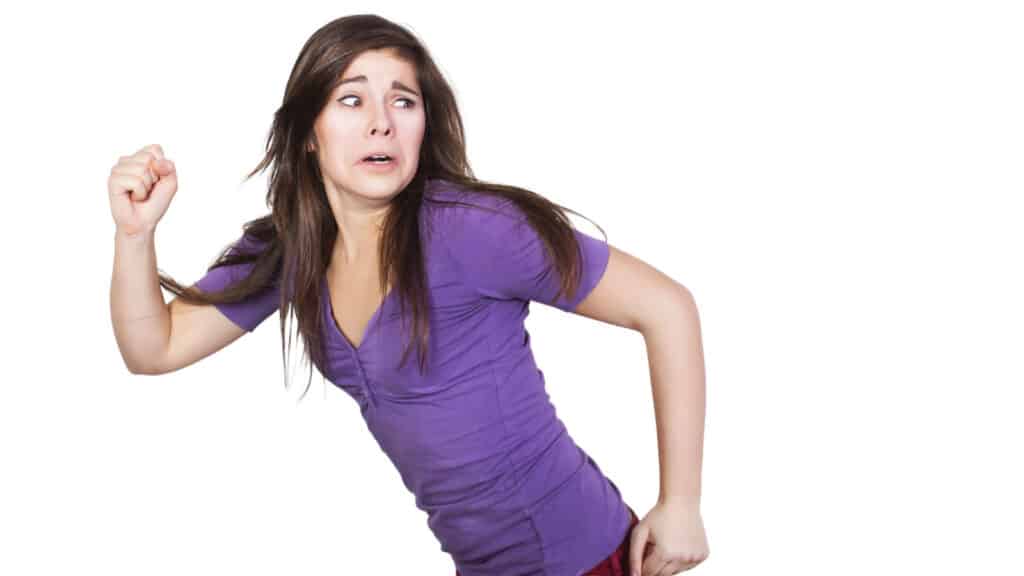 scared woman running