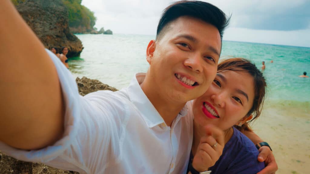Asian couple taking selfie