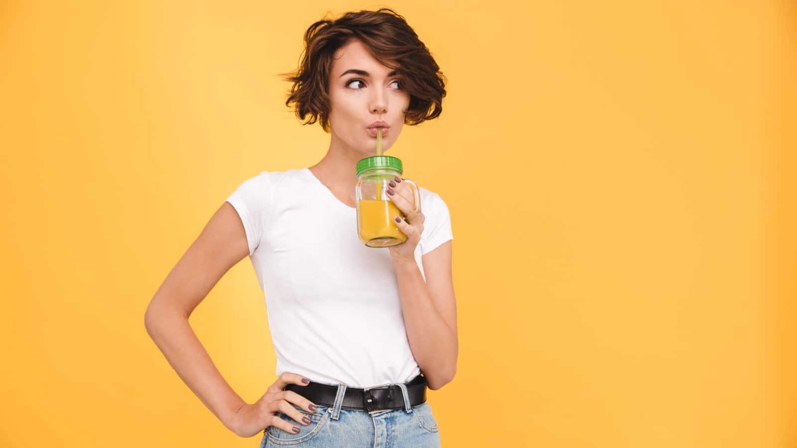 woman drinking fruit juice