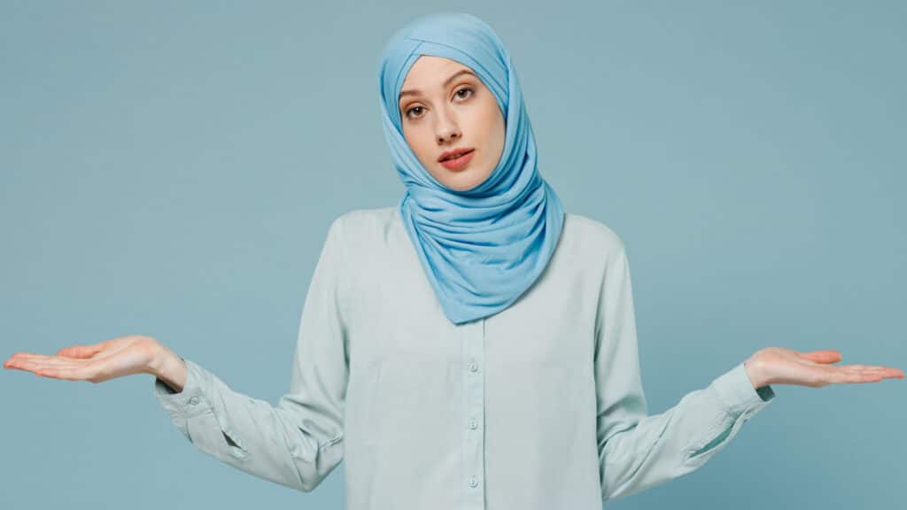 young Muslim woman shrug
