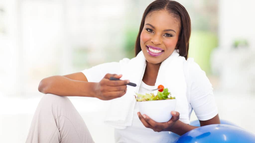 Black woman healthy salad