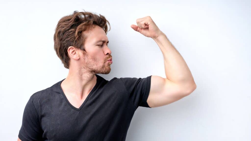 kissing bicep alpha male