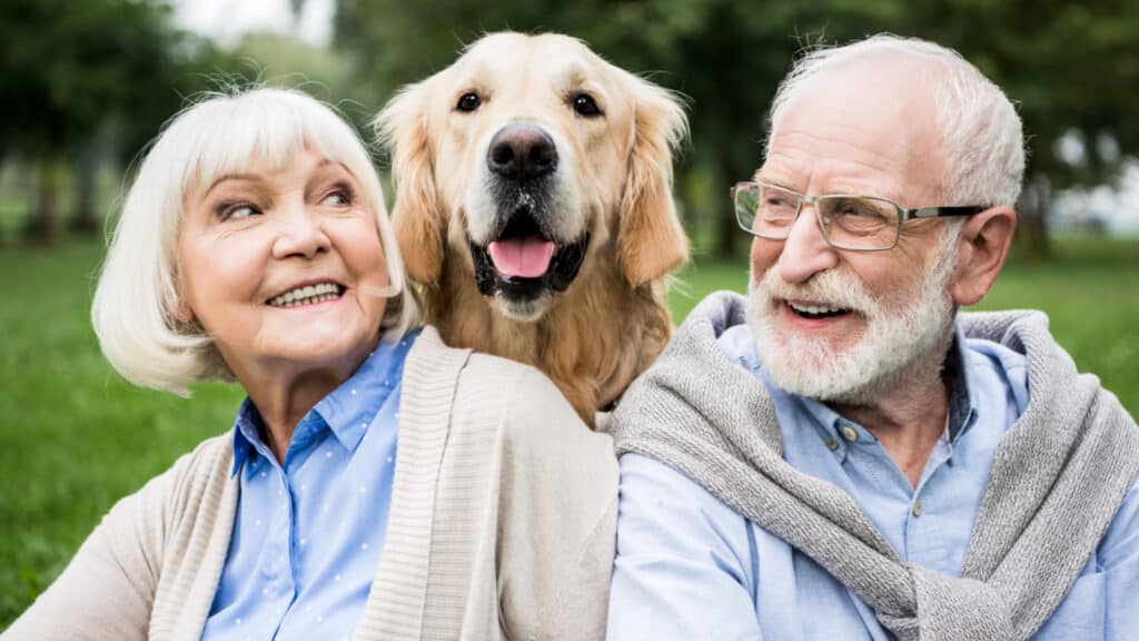 senior couple dog