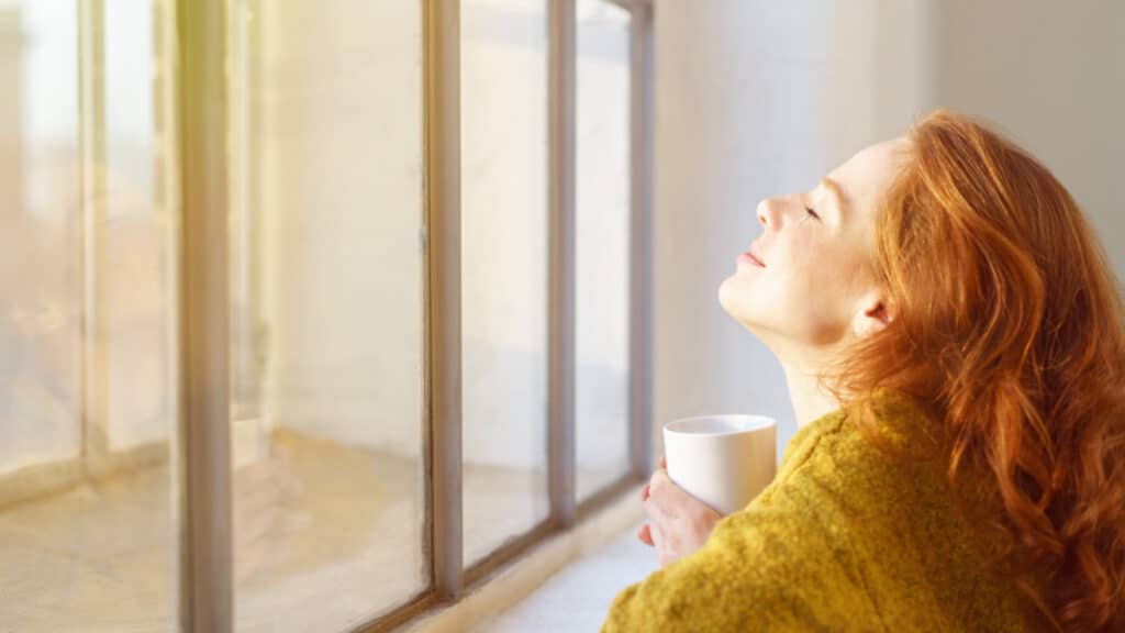 woman sun on face basking in the sun