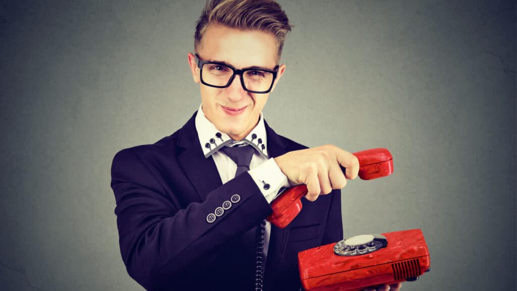 business man hanging up the phone